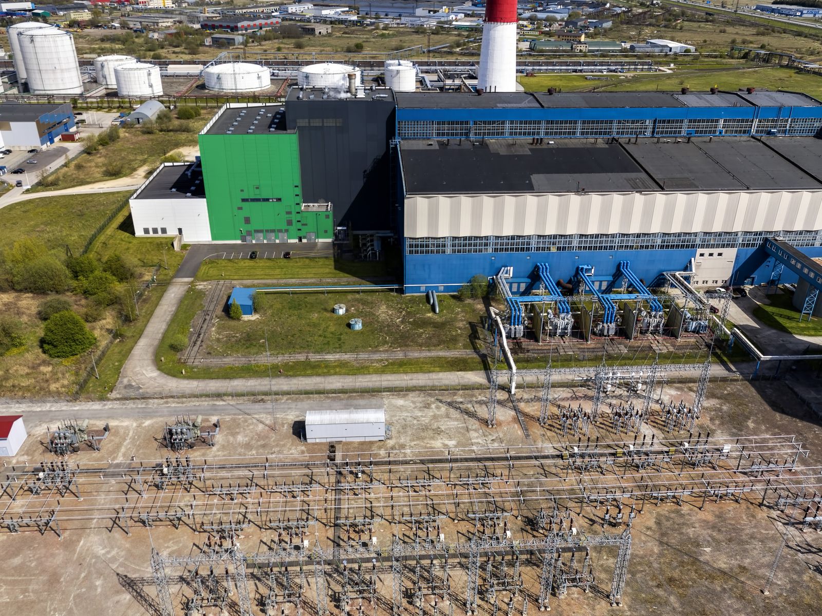 A high-voltage switchyard in front of the Iru power plant near Tallinn, seen from a drone