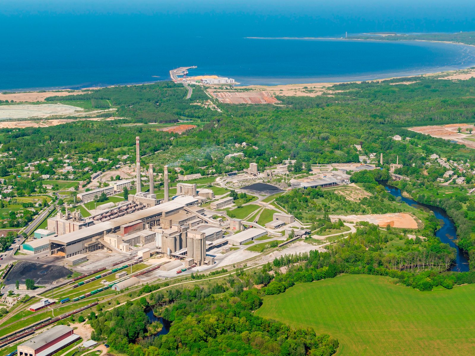 The Kunda cement works from the air, with the river, the town and the bay behind
