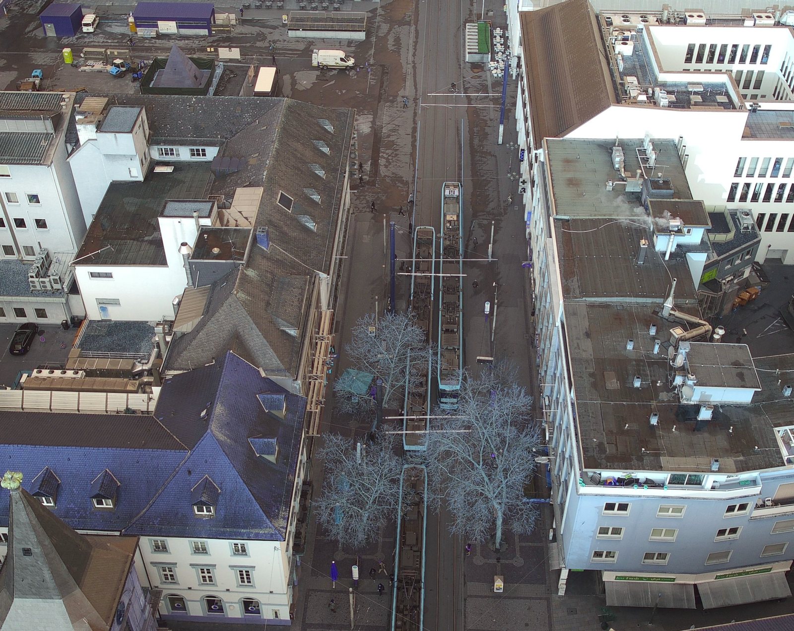 Roofs and a tram street in Karlsruhe seen from a drone early in the morning