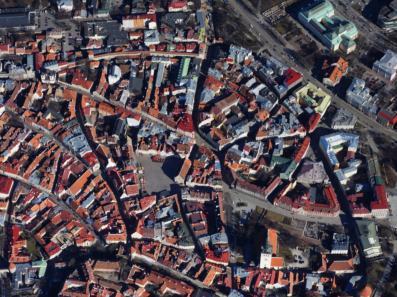 Tallinn Old Town from straight above: tiled roofs, courtyards and chimneys